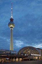 Alexanderplatz S-Bahn station with the Berlin TV tower in the evening