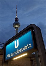 Alexanderplatz subway with Berlin TV tower in the evening