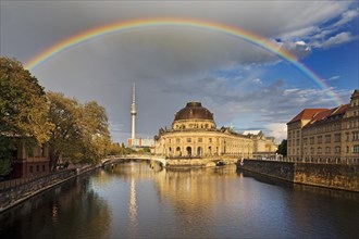 Rainbow over the Bode Museum and the Berlin TV Tower with the Spree River
