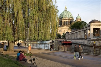 People in James Simon Park with Berlin Cathedral and the Spree River