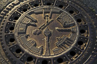 Berlin sights on a manhole cover of the Berliner Wasserbetriebe