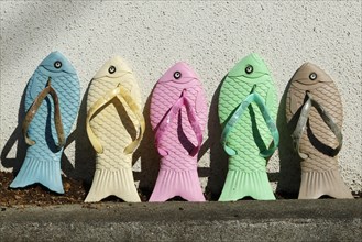 Colourful fish-shaped sandals as souvenirs