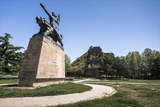 Statue of a hero in front of the fortress of Gori