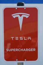 Sign and logo Tesla Supercharger