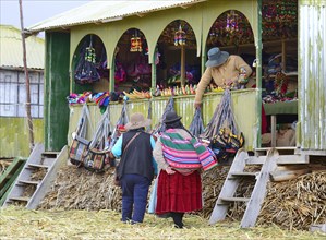 Souvenir shop with handicrafts on a floating island of the Uro