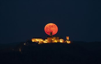 Wartburg castle at night with moonrise