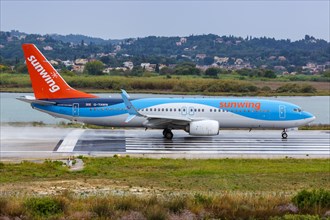 A Boeing 737-800 of Sunwing with registration G-TAWN at Corfu Airport