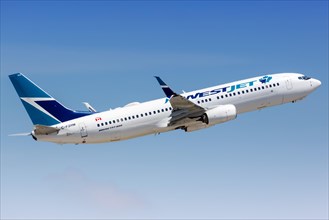 A Westjet Boeing 737-800 aircraft with registration C-FZRM takes off from Fort Lauderdale Airport