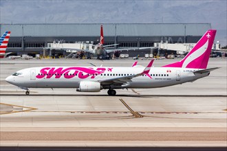 A Boeing 737-800 aircraft of the Swoop with the registration C-FPLS at the airport Las Vegas