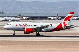 An Air Canada Rouge Airbus A319 aircraft with registration C-GARO lands at Las Vegas airport