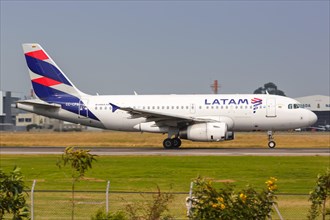 A LATAM Airbus A319 aircraft with registration CC-CPQ takes off from Bogota airport