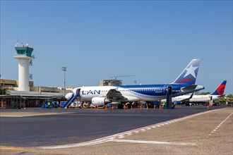 A LAN Airbus A320 aircraft with registration CC-BAW at Cartagena Airport
