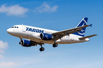 A TAROM Airbus A318 with the registration YR-ASD lands at London Heathrow Airport