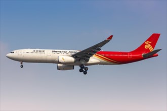 A Shenzhen Airlines Airbus A330-300 with registration number B-8865 at Shanghai Hongqiao Airport