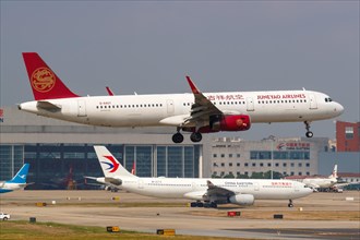 A Juneyao Airlines Airbus A321 with registration number B-8407 at Shanghai Hongqiao Airport