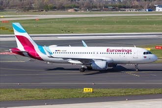 An Airbus A320 of Eurowings with the registration D-AEWF at Duesseldorf Airport