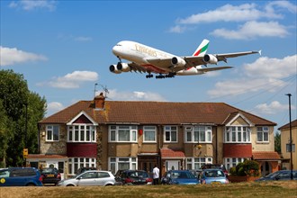 An Emirates Airbus A380-800 with registration number A6-EEC lands at London Heathrow Airport