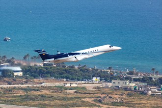An Embraer ERJ-135BJ Legacy 650 aircraft of Air Hamburg with registration D-AHOX takes off from Palma de Majorca Airport
