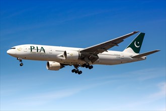 A Boeing 777-200ER aircraft of PIA Pakistan International with registration AP-BGJ lands at London Airport