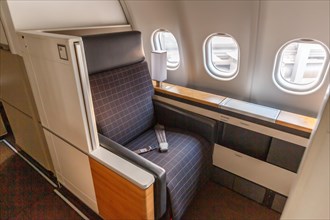 First class cabin of an Airbus A340-300 aircraft of Swiss at Zurich airport