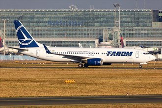 A Boeing 737-800 aircraft of Tarom with registration number YR-BGL at Frankfurt Airport