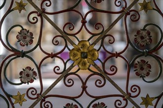 Wrought-iron grille with floral ornamentation in front of the high altar in the abbey church of St. James the Elder