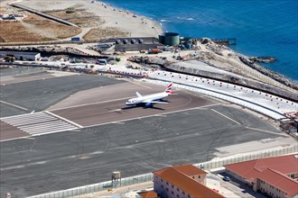 A British Airways Airbus A320 with the registration G-EUUX at Gibraltar airport
