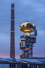 Kuchlbauer Tower or Hundertwasser Tower by Friedensreich Hundertwasser and Peter Pelican with chimney of the Kuchlbauer brewery