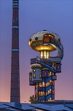 Kuchlbauer Tower or Hundertwasser Tower by Friedensreich Hundertwasser and Peter Pelican with chimney of the Kuchlbauer brewery