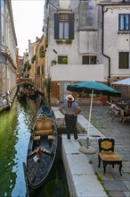 Gondolier at a canal