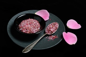 Rose salt in bowl and spoon