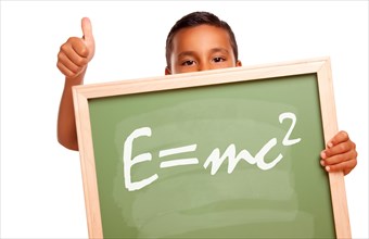 Proud hispanic boy holding chalkboard with the theory of relativity and thumbs up isolated on a white background