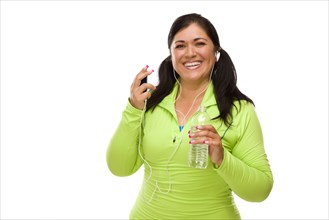Attractive middle aged hispanic woman in workout clothes with music player