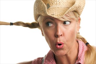 Attractive blond with cowboy hat isolated on a white background