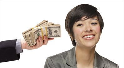 mixed-race young woman being handed thousands of dollars isolated on a white background