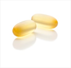 Omega 3 fish oil supplement capsules isolated on a white background