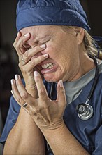 Hysterical agonizing crying female doctor or nurse