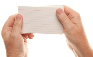 Male hand holding stack of flash cards isolated on a white background