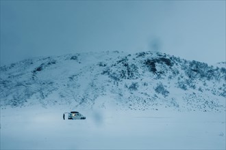 Camper in winter landscape