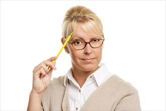 Beautiful woman with questioning expression holding pencil isolated on A white background