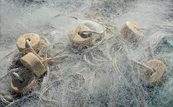 White fishing net with net floats
