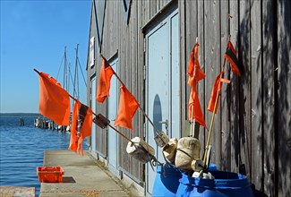 Red fishing flags in the fishing port of Rerik