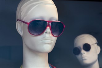 Fashion doll heads with sunglasses