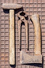 Old tool with hammer