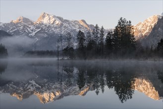 Alpine lake with reflection