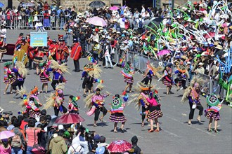 Plaza de Armas with indigenous dance group during a parade