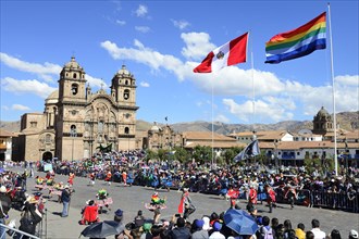 Cathedral Catedral Basilica de la Virgen de la Asuncion with flags of the city and Peru at the Plaza de Armas