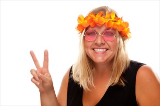 Beautiful smiling hippie girl with peace sign isolated on a white background