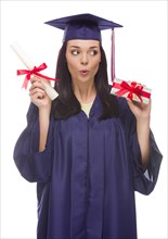 Happy female graduate with diploma and stack of gift wrapped hundred dollar bills isolated on a white background