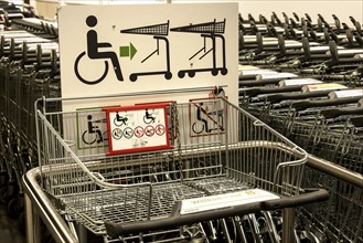 Shopping trolley for wheelchair users at Lidl discount store